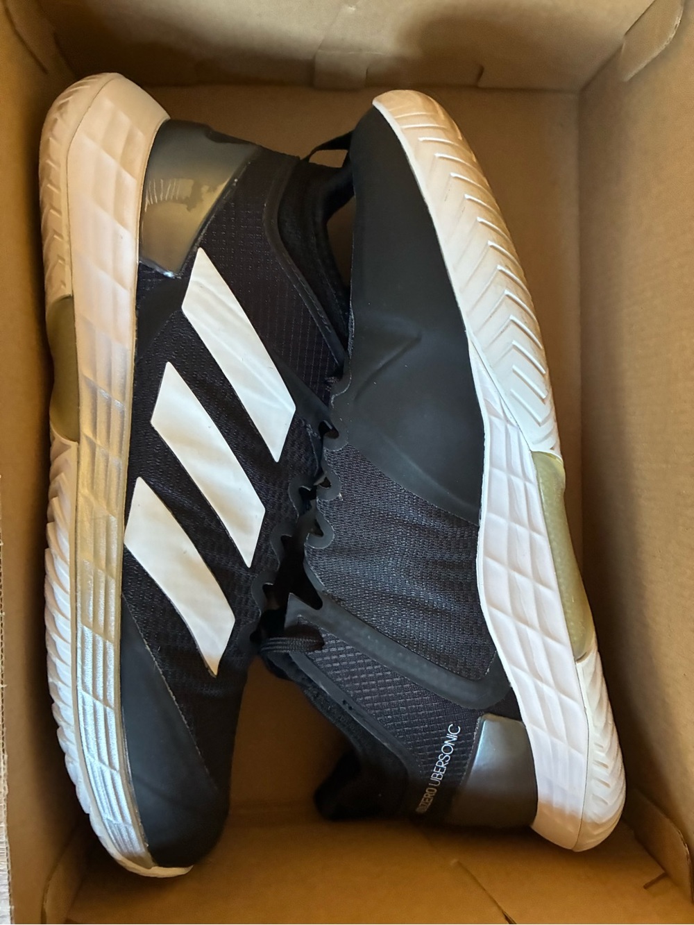 Adidas Ubersonic 4 Black and White Performance Tennis Shoes